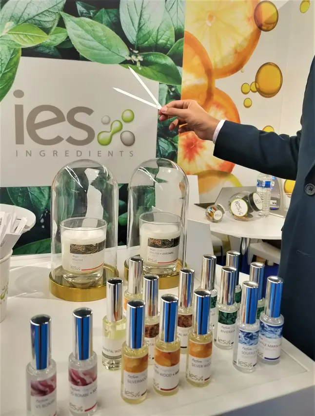 IES Ingredients stand with display of aroma and natural fragrance bottles at a professional trade show